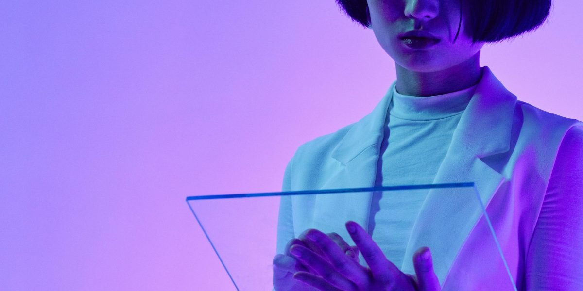 A professional thoughtfully observing future trends in technology and information, symbolizing progress and anticipation.