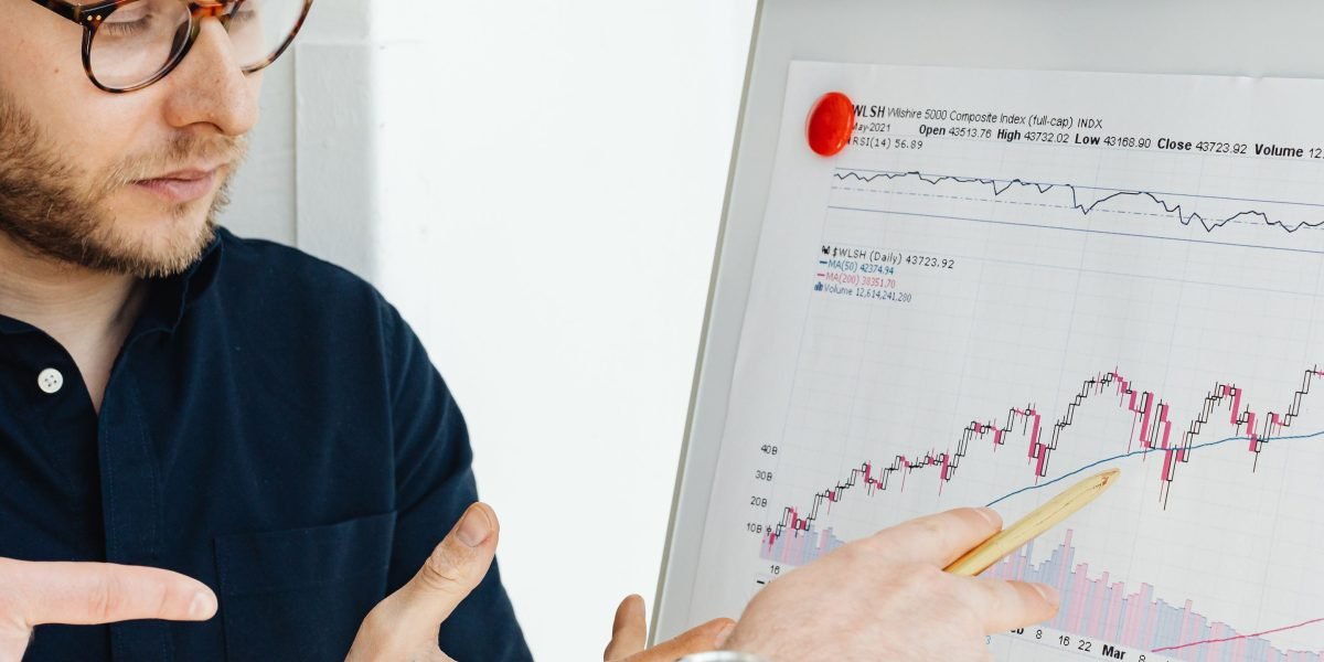 An editor and a data scientist discuss findings to ensure accuracy and address potential biases in a news story.