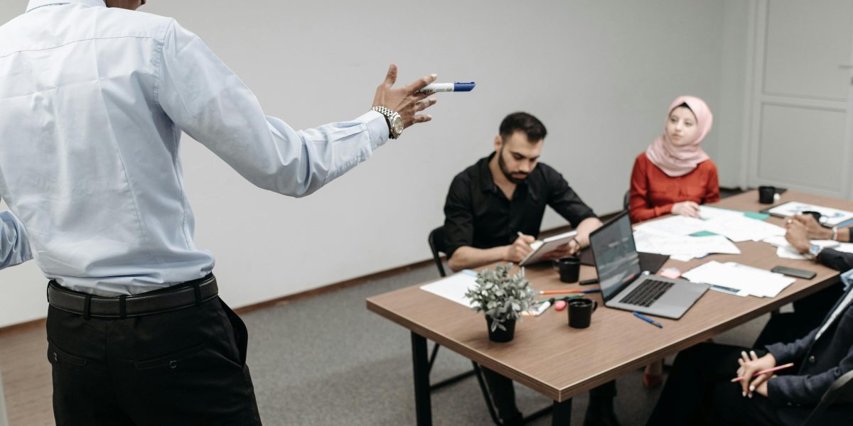 Professionals engage in a discussion about the ethical implications of AI in news and content creation.