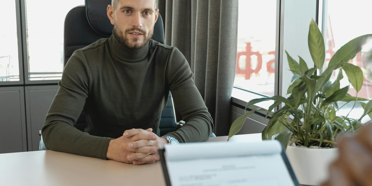 A person confidently engaging in a professional interaction, symbolizing the job application and interview process.