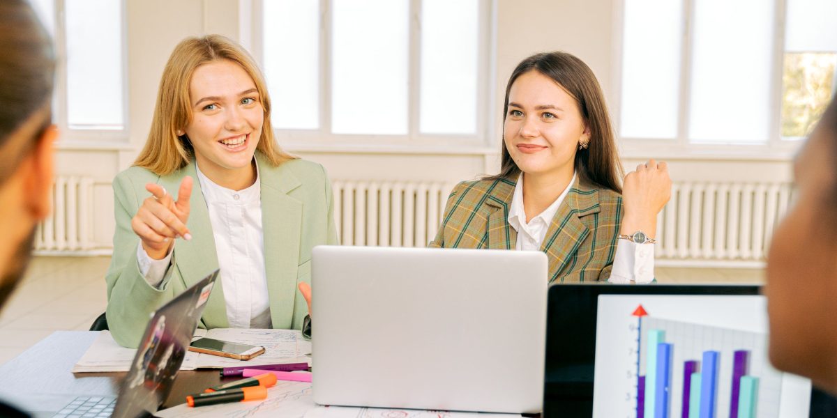 A team of professionals collaborating on a strategy, potentially related to information or media.