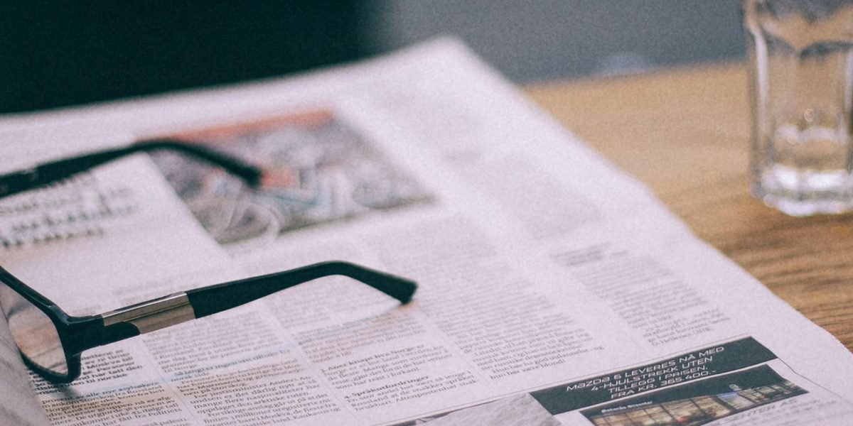 Uncover the Tabloid Newspaper Meaning: Size, Style, and Media Bias