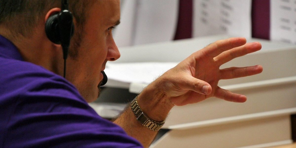 A person looking at a screen with a thoughtful, slightly concerned expression, contemplating privacy implications.