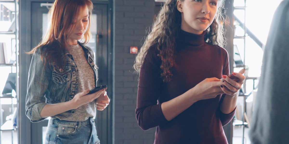 People consuming news and information from various digital sources on their devices.